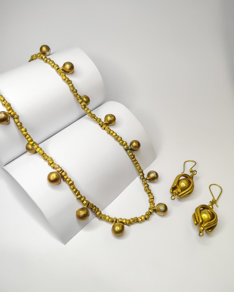 Nirmiti : The Dokra Brass Beads and balls Necklace with earrings