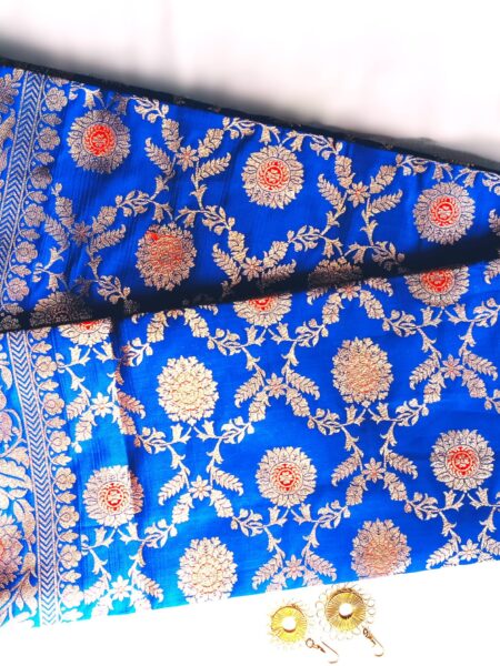 Banarasi zari, semi katan silk, blue colour with the blend of red meenakari