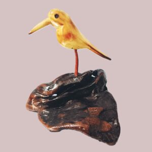 Aesthetic, hand carved, wooden bird with peculiar perch, height-5inch,width-4inch