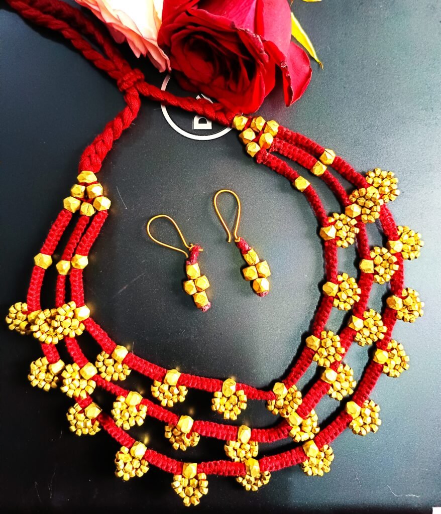 Elegant, three layered, brass sunflower petal motifs, partywear, with earrings, maroon colour