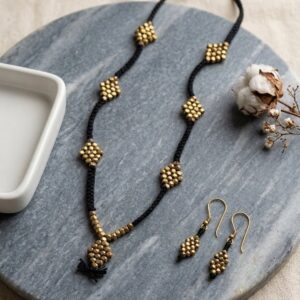 Single line burfi pendant with beads in black thread with earrings type 1